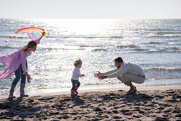 Image showing happy family enjoying vecation during autumn day