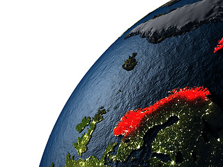 Image showing Norway in red on Earth at night