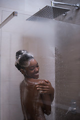 Image showing African American woman in the shower