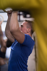 Image showing man doing dipping exercise