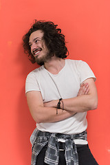 Image showing young man with funny hair over color background