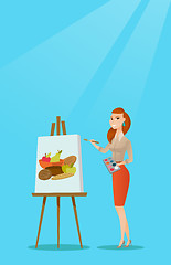 Image showing Creative female artist painting portrait.