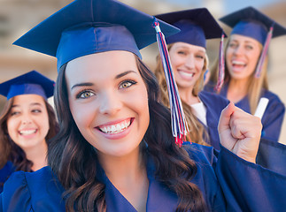 Image showing Happy Graduating Group of Girls In Cap and Gown Celebrating on C