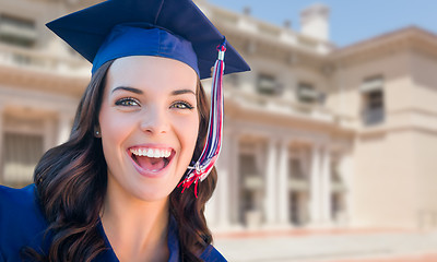 Image showing Happy Graduating Mixed Race Woman In Cap and Gown Celebrating on