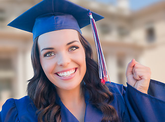 Image showing Happy Graduating Mixed Race Woman In Cap and Gown Celebrating on