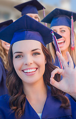 Image showing Happy Graduating Group of Girls In Cap and Gown Celebrating on C