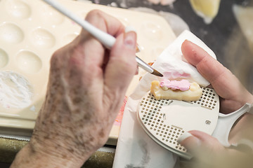 Image showing Dental Technician Applying Porcelain To 3D Printed Implant Mold