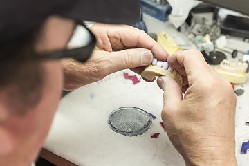 Image showing Dental Technician Working On 3D Printed Mold For Tooth Implants