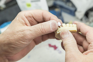 Image showing Dental Technician Working On 3D Printed Mold For Tooth Implants