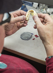 Image showing Dental Technician Working On 3D Printed Mold For Tooth Implants