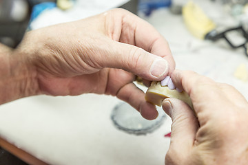 Image showing Dental Technician Working On 3D Printed Mold For Tooth Implants
