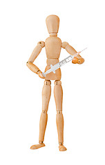 Image showing Wooden mannequin holding syringe