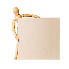 Image showing Wooden model dummy holding blank carton board