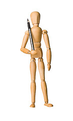 Image showing Wooden mannequin holding a pen