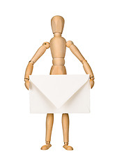 Image showing Wooden model dummy holding envelop