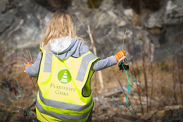 Image showing Picking up Plastic Waste