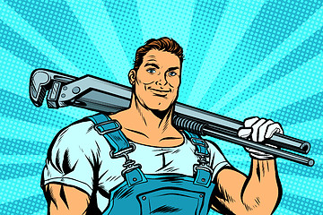 Image showing plumber worker with adjustable wrench