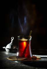 Image showing Turkish tea on black background