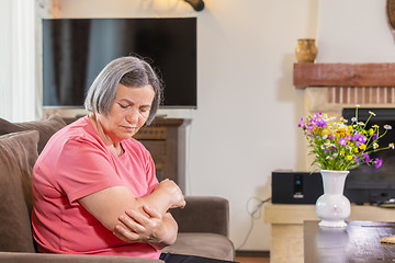 Image showing Elbow pain in an hand’s elderly person