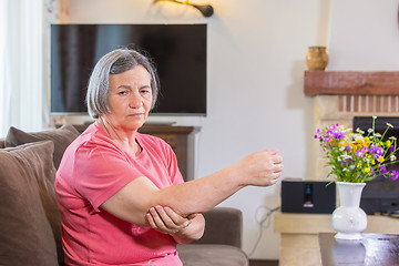 Image showing Elbow pain in an hand’s elderly person