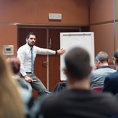 Image showing Speaker Giving a Talk at Business Meeting.