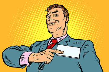 Image showing Businessman points at a name badge id