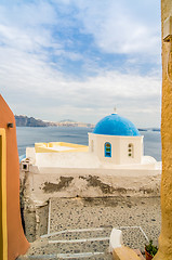 Image showing Unique Santorini architecture, church with blue cupola