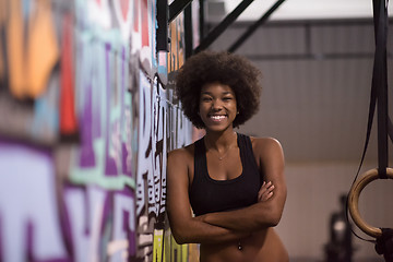 Image showing portrait of black women after workout dipping exercise