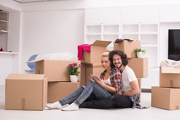 Image showing young couple moving  in new house