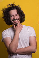 Image showing young man with funny hair over color background