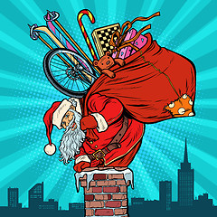 Image showing Activities and games. Santa Claus with gifts climbs into the chi