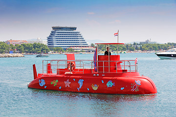 Image showing Red Semi-submarine with glass bottom so tourists can see the mar