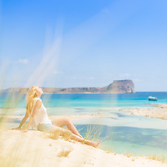 Image showing Relaxed Happy Woman Enjoying Sun on Vacations.