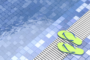 Image showing Flip flops by the swimming pool