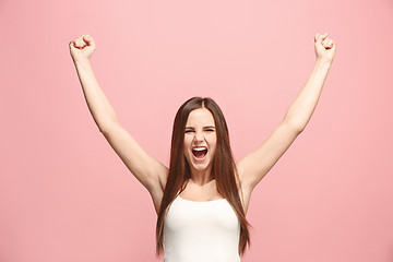 Image showing Winning success woman happy ecstatic celebrating being a winner. Dynamic energetic image of female model