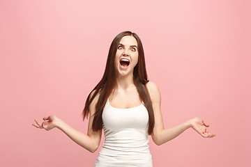 Image showing The squint eyed woman with weird expression isolated on pink