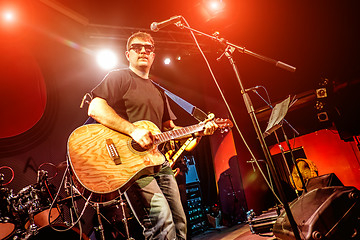 Image showing Band performs on stage in a nightclub