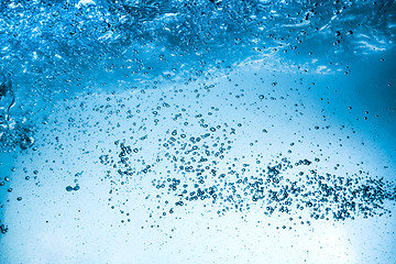 Image showing Many bubbles in water close up, abstract water wave with bubbles