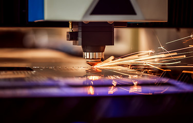 Image showing CNC Laser cutting of metal, modern industrial technology.