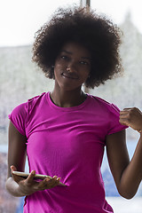 Image showing african american woman using tablet