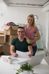 Image showing Young couple moving in a new home