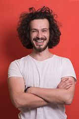 Image showing young man with funny hair over color background