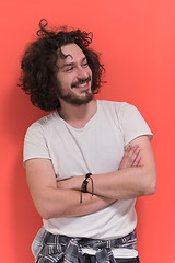 Image showing young man with funny hair over color background