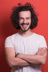 Image showing young man with funny hair over color background