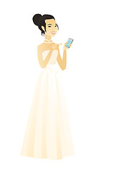 Image showing Asian fiancee holding a mobile phone.