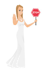 Image showing Caucasian fiancee holding stop road sign.