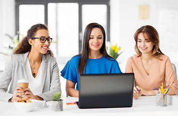 Image showing businesswomen with laptop working at office