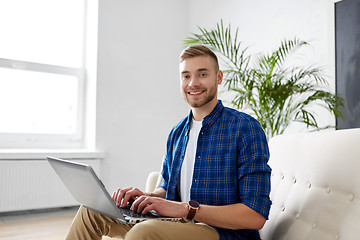 Image showing man with laptop working at office