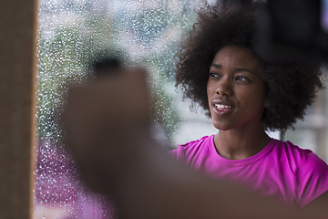 Image showing african american woman using tablet