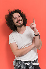 Image showing young man with funny hair over color background